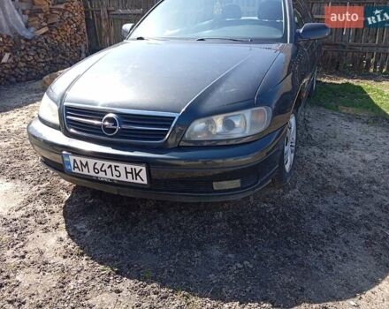 Черный Опель Омега, объемом двигателя 2.2 л и пробегом 330 тыс. км за 2500 $, фото 2 на Automoto.ua
