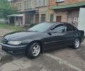 Черный Опель Омега, объемом двигателя 2.5 л и пробегом 285 тыс. км за 3200 $, фото 1 на Automoto.ua