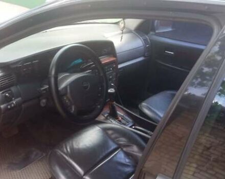 Черный Опель Омега, объемом двигателя 2.5 л и пробегом 400 тыс. км за 3000 $, фото 5 на Automoto.ua