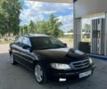 Чорний Опель Омега, об'ємом двигуна 2.6 л та пробігом 300 тис. км за 3358 $, фото 1 на Automoto.ua