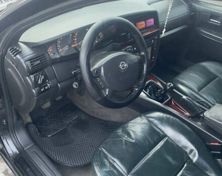 Черный Опель Омега, объемом двигателя 2.17 л и пробегом 374 тыс. км за 3100 $, фото 16 на Automoto.ua