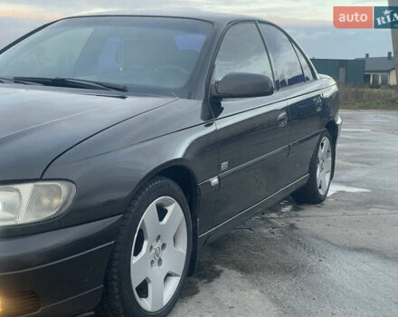 Черный Опель Омега, объемом двигателя 2.17 л и пробегом 374 тыс. км за 3100 $, фото 6 на Automoto.ua