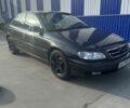 Черный Опель Омега, объемом двигателя 2.2 л и пробегом 320 тыс. км за 1899 $, фото 1 на Automoto.ua