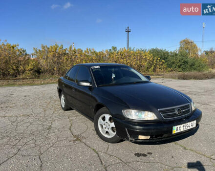 Опель Омега 2001 у Вінниці на Automoto.ua Чорний Опель Омега, об'ємом двигуна 2.2 л та пробігом 319 тис. км за 2000 $, фото 9 на Automoto.ua