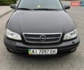 Черный Опель Омега, объемом двигателя 2.2 л и пробегом 318 тыс. км за 3000 $, фото 1 на Automoto.ua