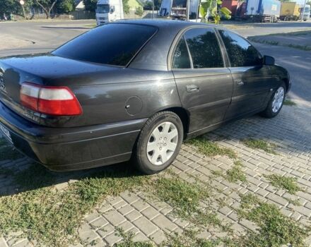 Черный Опель Омега, объемом двигателя 2.2 л и пробегом 280 тыс. км за 2700 $, фото 3 на Automoto.ua