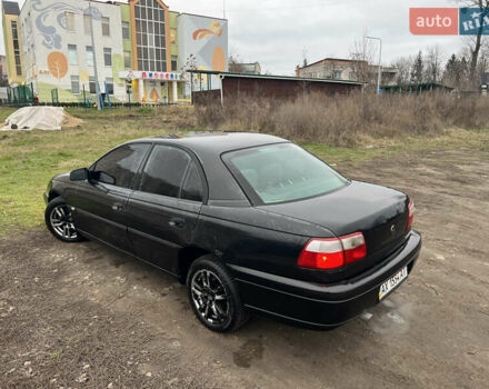 Черный Опель Омега, объемом двигателя 2.2 л и пробегом 319 тыс. км за 2000 $, фото 10 на Automoto.ua