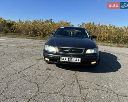 Опель Омега 2001 у Вінниці на Automoto.ua Чорний Опель Омега, об'ємом двигуна 2.2 л та пробігом 319 тис. км за 2000 $, фото 2 на Automoto.ua