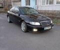 Черный Опель Омега, объемом двигателя 2.6 л и пробегом 260 тыс. км за 3100 $, фото 1 на Automoto.ua