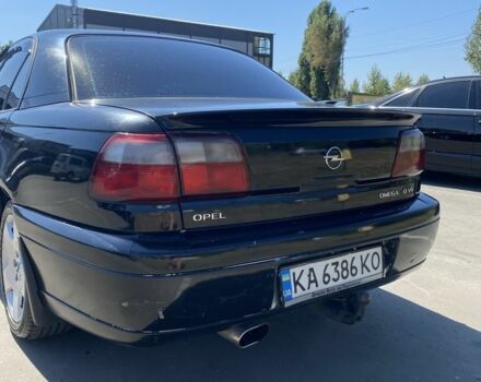 Чорний Опель Омега, об'ємом двигуна 3 л та пробігом 400 тис. км за 3499 $, фото 4 на Automoto.ua
