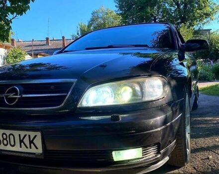 Черный Опель Омега, объемом двигателя 2.6 л и пробегом 436 тыс. км за 3800 $, фото 2 на Automoto.ua