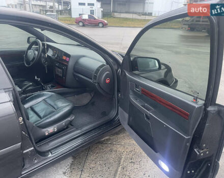 Черный Опель Омега, объемом двигателя 2.17 л и пробегом 374 тыс. км за 3100 $, фото 11 на Automoto.ua