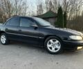 Черный Опель Омега, объемом двигателя 2.2 л и пробегом 450 тыс. км за 2600 $, фото 2 на Automoto.ua