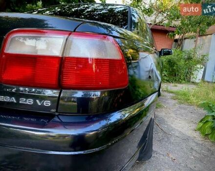 Черный Опель Омега, объемом двигателя 2.6 л и пробегом 434 тыс. км за 3500 $, фото 4 на Automoto.ua
