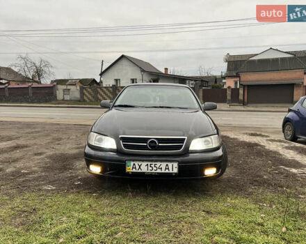 Черный Опель Омега, объемом двигателя 2.2 л и пробегом 319 тыс. км за 2000 $, фото 4 на Automoto.ua