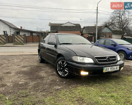 Черный Опель Омега, объемом двигателя 2.2 л и пробегом 319 тыс. км за 2000 $, фото 5 на Automoto.ua