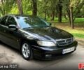 Черный Опель Омега, объемом двигателя 3 л и пробегом 250 тыс. км за 3100 $, фото 1 на Automoto.ua