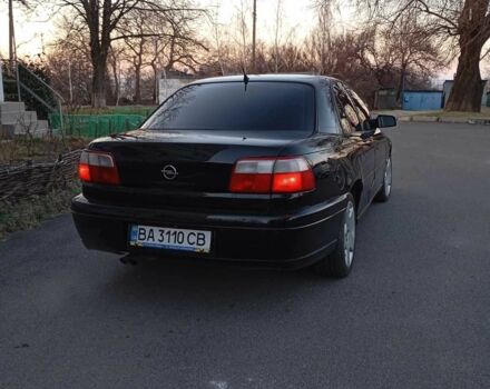Черный Опель Омега, объемом двигателя 2.6 л и пробегом 260 тыс. км за 3100 $, фото 1 на Automoto.ua