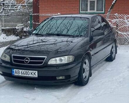 Черный Опель Омега, объемом двигателя 2.6 л и пробегом 434 тыс. км за 3500 $, фото 7 на Automoto.ua