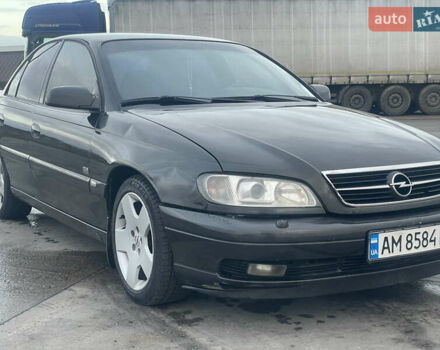 Черный Опель Омега, объемом двигателя 2.17 л и пробегом 374 тыс. км за 3100 $, фото 3 на Automoto.ua