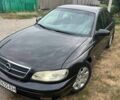 Черный Опель Омега, объемом двигателя 2.17 л и пробегом 330 тыс. км за 3300 $, фото 1 на Automoto.ua