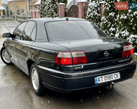 Черный Опель Омега, объемом двигателя 2.2 л и пробегом 290 тыс. км за 2350 $, фото 26 на Automoto.ua