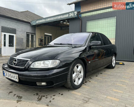 Черный Опель Омега, объемом двигателя 2.5 л и пробегом 280 тыс. км за 4300 $, фото 2 на Automoto.ua