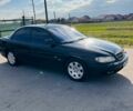Черный Опель Омега, объемом двигателя 2.2 л и пробегом 223 тыс. км за 2350 $, фото 1 на Automoto.ua