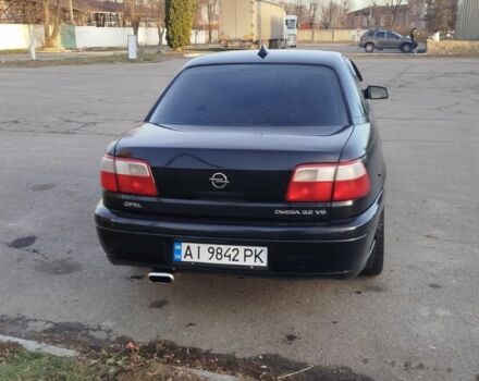 Черный Опель Омега, объемом двигателя 3.2 л и пробегом 315 тыс. км за 3000 $, фото 6 на Automoto.ua