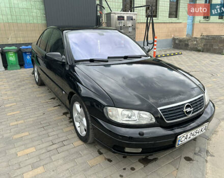 Черный Опель Омега, объемом двигателя 2.5 л и пробегом 280 тыс. км за 4300 $, фото 8 на Automoto.ua