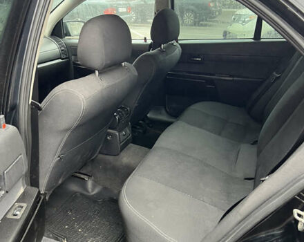 Черный Опель Омега, объемом двигателя 2.2 л и пробегом 320 тыс. км за 2999 $, фото 4 на Automoto.ua