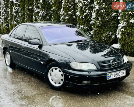 Черный Опель Омега, объемом двигателя 2.2 л и пробегом 290 тыс. км за 2350 $, фото 29 на Automoto.ua