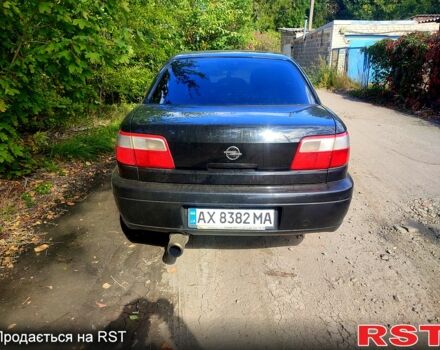 Черный Опель Омега, объемом двигателя 2.2 л и пробегом 260 тыс. км за 2200 $, фото 2 на Automoto.ua