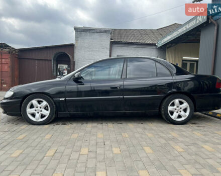 Черный Опель Омега, объемом двигателя 2.5 л и пробегом 280 тыс. км за 4300 $, фото 3 на Automoto.ua