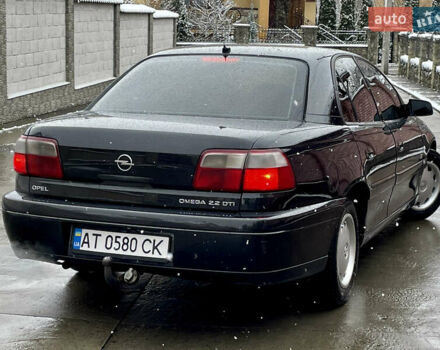 Черный Опель Омега, объемом двигателя 2.2 л и пробегом 290 тыс. км за 2350 $, фото 25 на Automoto.ua