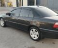 Черный Опель Омега, объемом двигателя 3.2 л и пробегом 315 тыс. км за 3000 $, фото 2 на Automoto.ua