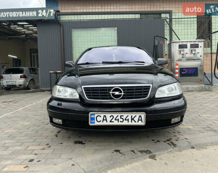 Черный Опель Омега, объемом двигателя 2.5 л и пробегом 280 тыс. км за 4300 $, фото 1 на Automoto.ua