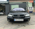 Черный Опель Омега, объемом двигателя 2.5 л и пробегом 280 тыс. км за 4300 $, фото 1 на Automoto.ua