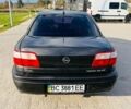 Черный Опель Омега, объемом двигателя 2.2 л и пробегом 223 тыс. км за 2350 $, фото 2 на Automoto.ua