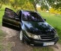 Черный Опель Омега, объемом двигателя 2.2 л и пробегом 420 тыс. км за 3100 $, фото 1 на Automoto.ua