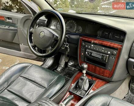 Черный Опель Омега, объемом двигателя 2.2 л и пробегом 290 тыс. км за 2350 $, фото 7 на Automoto.ua