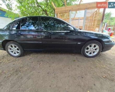 Черный Опель Омега, объемом двигателя 2.5 л и пробегом 300 тыс. км за 4000 $, фото 5 на Automoto.ua