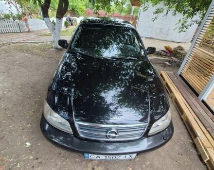 Черный Опель Омега, объемом двигателя 2.5 л и пробегом 300 тыс. км за 4000 $, фото 1 на Automoto.ua
