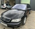 Черный Опель Омега, объемом двигателя 2.5 л и пробегом 270 тыс. км за 4300 $, фото 1 на Automoto.ua