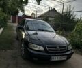 Черный Опель Омега, объемом двигателя 2.2 л и пробегом 300 тыс. км за 2600 $, фото 3 на Automoto.ua