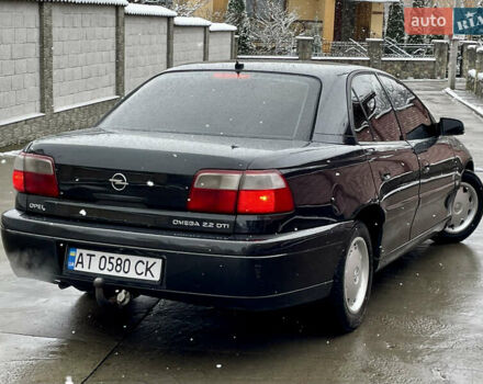 Черный Опель Омега, объемом двигателя 2.2 л и пробегом 290 тыс. км за 2350 $, фото 23 на Automoto.ua