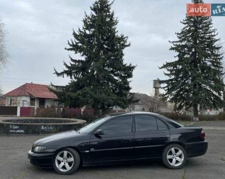 Черный Опель Омега, объемом двигателя 2.5 л и пробегом 390 тыс. км за 3400 $, фото 5 на Automoto.ua