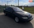 Черный Опель Омега, объемом двигателя 2.2 л и пробегом 223 тыс. км за 2350 $, фото 12 на Automoto.ua