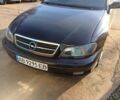 Черный Опель Омега, объемом двигателя 2.2 л и пробегом 330 тыс. км за 2450 $, фото 1 на Automoto.ua