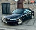 Чорний Опель Омега, об'ємом двигуна 2.2 л та пробігом 312 тис. км за 2999 $, фото 1 на Automoto.ua